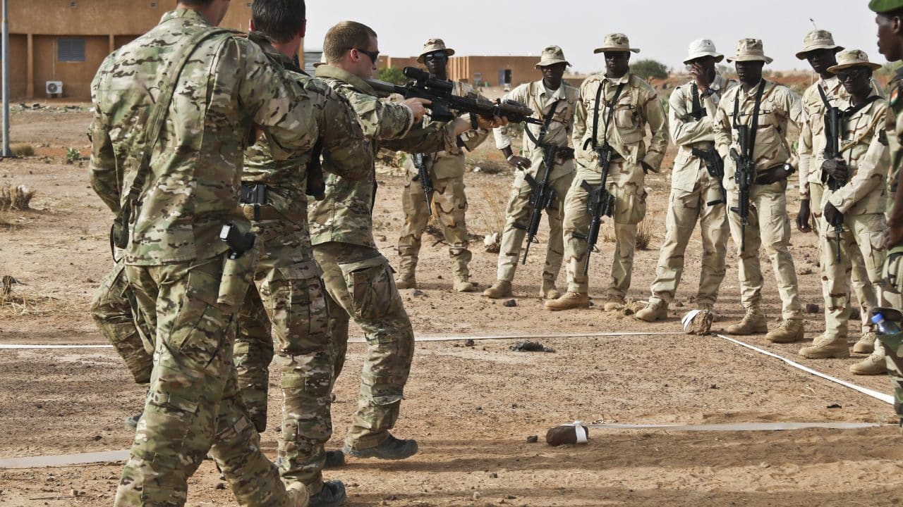 U.S. Army Special Forces Operational Detachment-Alpha Soldiers in 3rd Special Forces Group (Airborne) train Senegal Soldiers on how to clear a room in a glass house during Flintlock in Tahoua, Niger.